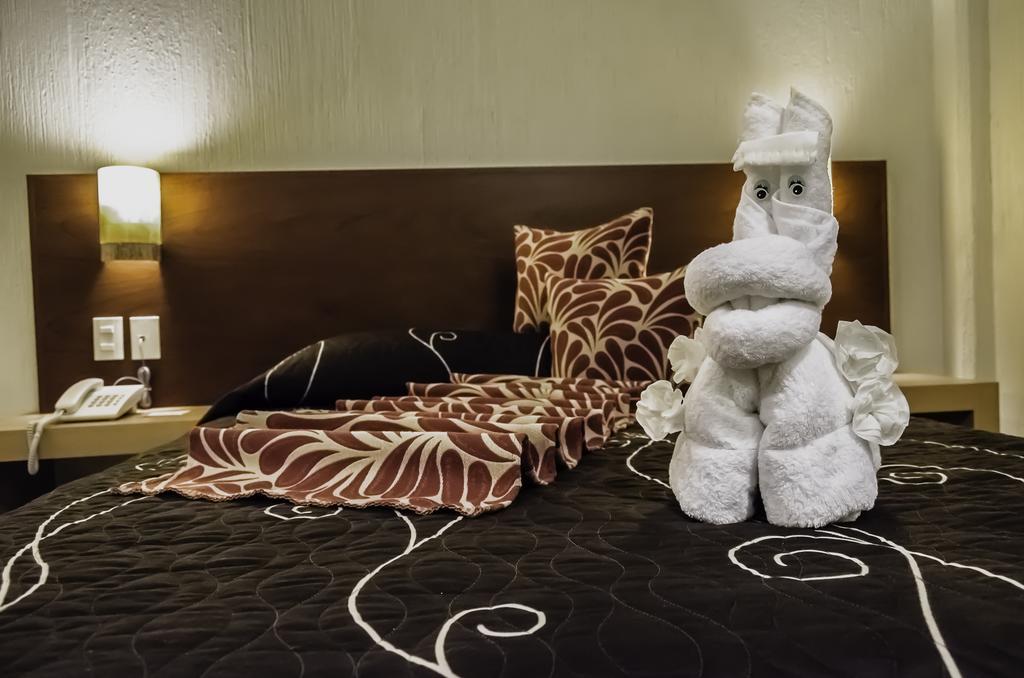 Hotel Petit Теуакан Номер фото